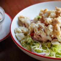 Combo Louie Salad · Crab meat and shrimp on a bed of shredded iceberg lettuce with julienned red onion, whole ch...