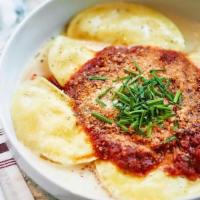 Cheese Ravioli · Traditional house-made, ricotta-filled ravioli in our marinara sauce and finished with fresh...