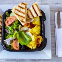 Chicken Kabob Plate · Comes with rice, salad, grilled vetoes and pita.
