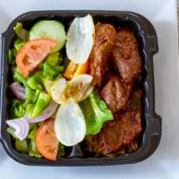 Beef Kabob Plate · Comes with rice, salad, grilled vetoes and pita.