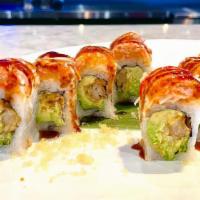 Fluffy Maki · Shrimp tempura and avocado topped with crab stick, mayo, tempura flakes, and eel sauce.