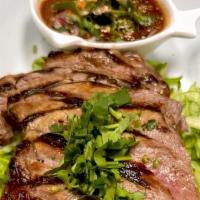 Crying Tiger · Grilled beef served with northeastern Thai styled spicy lime dipping sauce