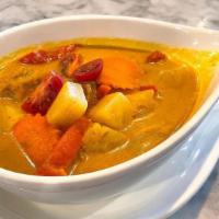 Yellow Curry With Rice · Onion, carrot, pineapple, and red bell peppers in Thai yellow coconut-based curry