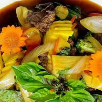 Stir Fried Basil · (served with white or brown rice) Stir fried mixed vegetables, bamboo shoots with your choic...