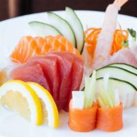 Sashimi · 14 pieces Assorted sliced fish.