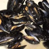 Mussels · Prince Edward island mussels simmered in red (fra diavolo) or white (garlic wine) sauce.
