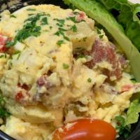Cold Country Potato Salad · Our country potato salad is made with red bliss potatoes, hard boiled eggs, mustard, mayo, p...