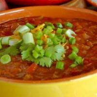Chili Con Carne · Slow cooked, rich and zesty blend of ground beef, red beans, onions and sweet bell peppers i...
