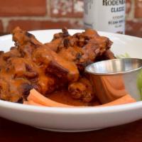 Sutton'S Wings · Our fall apart wings served in your choice of sauce.