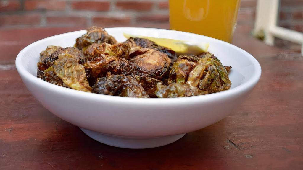 Brussels · Crispy brussel sprouts in honey with a hint of lemon.