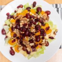 Harvest Salad · Mandarin, walnuts, lettuce, grapes, apple, and raisins.