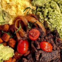 Shawarma · Shaved filet of steak, Middle Eastern spices, pita, cherry tomatoes, avocado tartar spread, ...