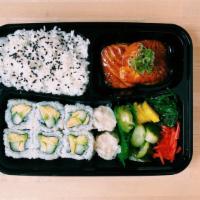 Salmon Teriyaki Bento · Teriyaki  salmon with steamed rice,
2pc shumai, seaweed salad, pickled
vegetables & 6pc cucu...