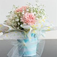 Sweet Baby  · Seasonal flowers arrangement for a new baby! 
Box/Bucket will be different from photo we wil...