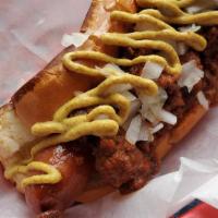 Norc Dog · Classic with chili, yellow mustard and raw onion