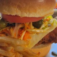 Fried Chicken Burger Viennois · Pumpkin Seeds,  Coleslaw, Swiss Cheese, Pickles, LTO and house fries.