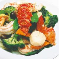 Seafood Delight · Lobster meat, jumbo shrimp, scallops, crab meat with snow pea pods, broccoli, mushrooms, Chi...