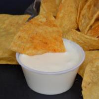 Chips And Queso* · Seasoned chips and 4oz Queso