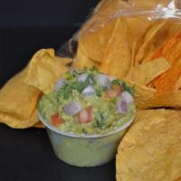 Chips And Guacamole* · Seasoned chips and 4oz Guacamole
