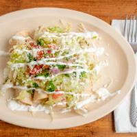 Flautas · 5 Crisped corn tortillas, topped with Fried beans, Lettuce, Cream cheese, Pico de gallo and...