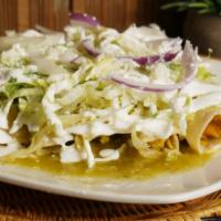 Enchiladas · 5 rolled tortillas stuffed with chicken in green sauce. Topped with lettuce, Mexican cheese,...