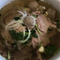 (31.) Dac Biet · Special Beef noodle soup with rare eye round, well done flank, tendon, beef ball & tripe.