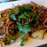 (101.) Pla Lui Sourn (Dinner) · Hot & spicy. A choice of fillet Tilapia or grilled Atlantic salmon topped with lime, ginger,...