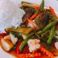 (97.) Thai Spicy Seafood (Dinner) · Hot & spicy. Stir-fried fresh seafood (shrimp, scallop, squid, mussel). Thai Herb, young gre...