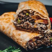 Chopped Steak Wrap · Sirloin steak grilled with fresh mushrooms, onions & green peppers,
wrapped in lavash bread ...