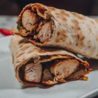 Grilled Chicken Wrap · Grilled chicken breast, lettuce, tomatoes and red onions wrapped in lavash
bread , minty cuc...