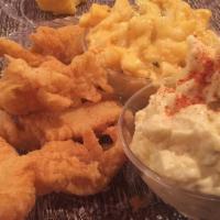 Crispy Fried Catfish Strips · Fried catfish strip served homemade tartar sauce.