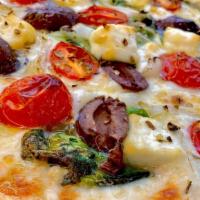The Greek Pizza · Garlic infused olive oil, cheese blend, fresh spinach, kalamata olives, feta cheese, tomatoe...