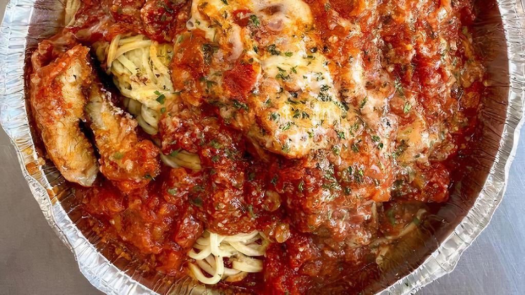Chicken Parmigiana · With spaghetti. Scaramuzzas pasta served with breadstick.