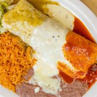 Burrito Loco · Choice of grilled chicken breast or grilled steak, sautéed with onions and bell peppers. Top...