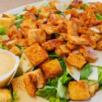 Chicken Caesar Salad · Grilled chicken breast, romaine lettuce, and Parmesan cheese, topped with creamy Caesar dres...
