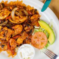 Arroz Con Pollo · Chicken breast strips sautéed in a mild tomato sauce with onions, bell peppers, and mushroom...