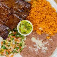 Carne Asada · A delicious half pound skirt steak perfectly seasoned, sliced thin, and served with Mexican ...