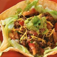 Taco Salad · Bowl in a fried flower tortilla.Rice, beans, choose any meat, lettuce sour cream, pico de Ga...
