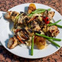 Kabob (Entrée) · Choice of protein served over a bed of rice.