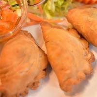 Ka Ree Puff · Homemade Thai pastry puff stuffed with minced chicken, diced potatoes, onions and curry flav...