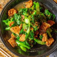 Ka Na Moo Grob · Spicy.  Stir fried Chinese broccoli with crispy pork rind.