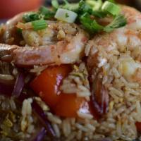 Pik Pow Fried Rice · Spicy. Spicy fried rice with egg, red onions, peppers and scallion in Pik pow sauce.