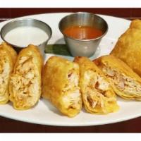 Buffalo Chicken Eggrolls · Boneless chicken, American cheese, hot sauce.  Served with blue cheese dressing and hot sauc...