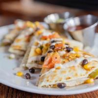 Stacked Chicken Quesadilla · Boneless chicken, cheddar & jack, caramelized poblano peppers and onions, . black bean, corn...