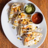 Crab Quesadilla · Lump crab filling, fontina cheese, caramelized poblano peppers and onions, black bean, corn ...
