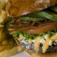 California Cobb Burger · Lime infused guacamole, blue cheese mousse, chipotle aioli bacon, lettuce, tomato, red onion...