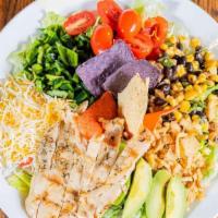 Southwestern Cobb Salad · Mixed greens, chicken breast, sliced avocado,diced tomato, poblano peppers, black bean and c...