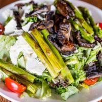 Grilled Portabello Salad · Marinated mushrooms, mixed greens,ricotta salata, . tomatoes, asparagus, truffle balsamic vi...