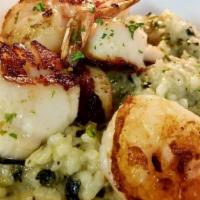 Shrimp & Scallops Risotto · Pan seared sea scallops and Gulf shrimp, sauteed mushrooms, amaretto cream sauce, served ove...