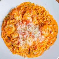 Shrimp & Scallops Linguine · Shrimp, scallops, fresh basil and tomato, blush tomato cream sauce,  . fresh linguini, Parmi...